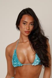 Concha Shell Bikini Top in Blue - close-up of individually stitched shell sequins with pearlescent shimmer